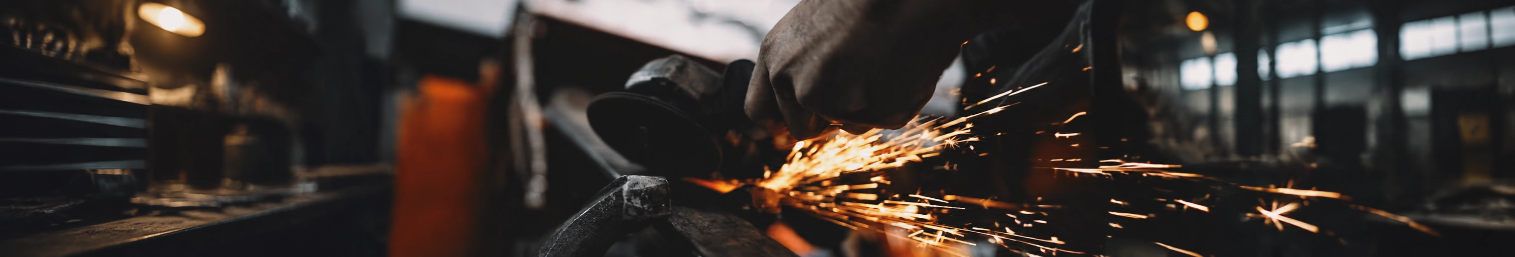 Sparks from metal grinding in an automotive workshop